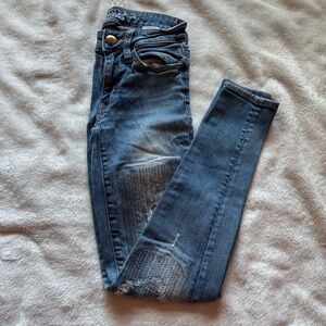 American Eagle Outfitters Blue Skinny Jeans with Distressed Details